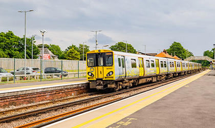 A train arriving at a station platform. 